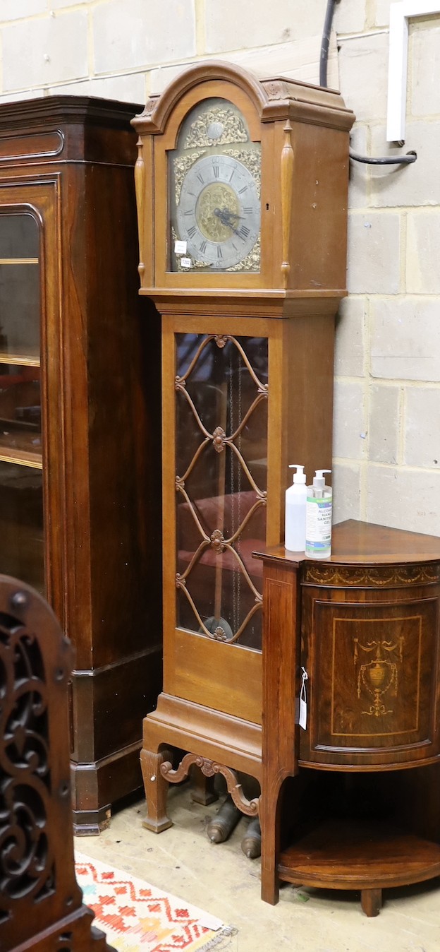 A late 19th century Danish oak cased thirty hour longcase clock, with dial dated 1887, height 220cm